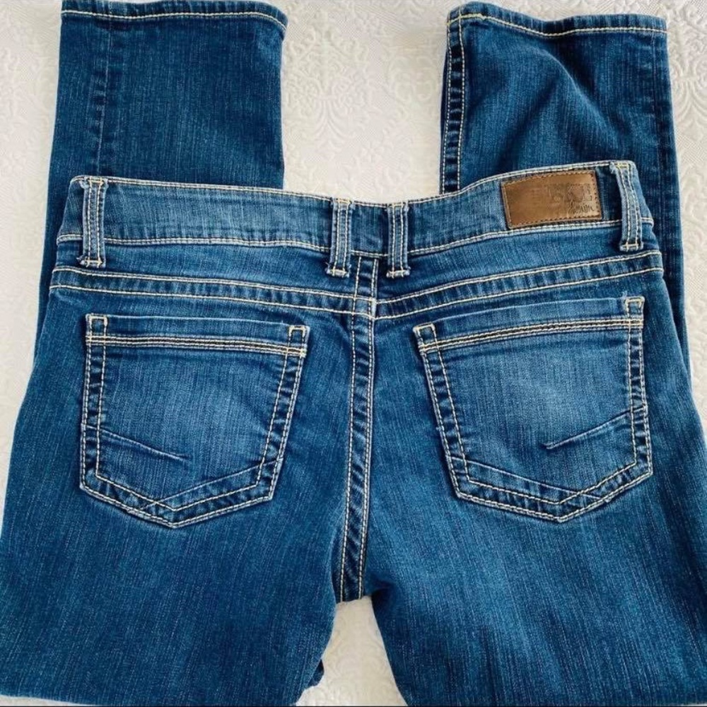 Buckle boot cut jeans